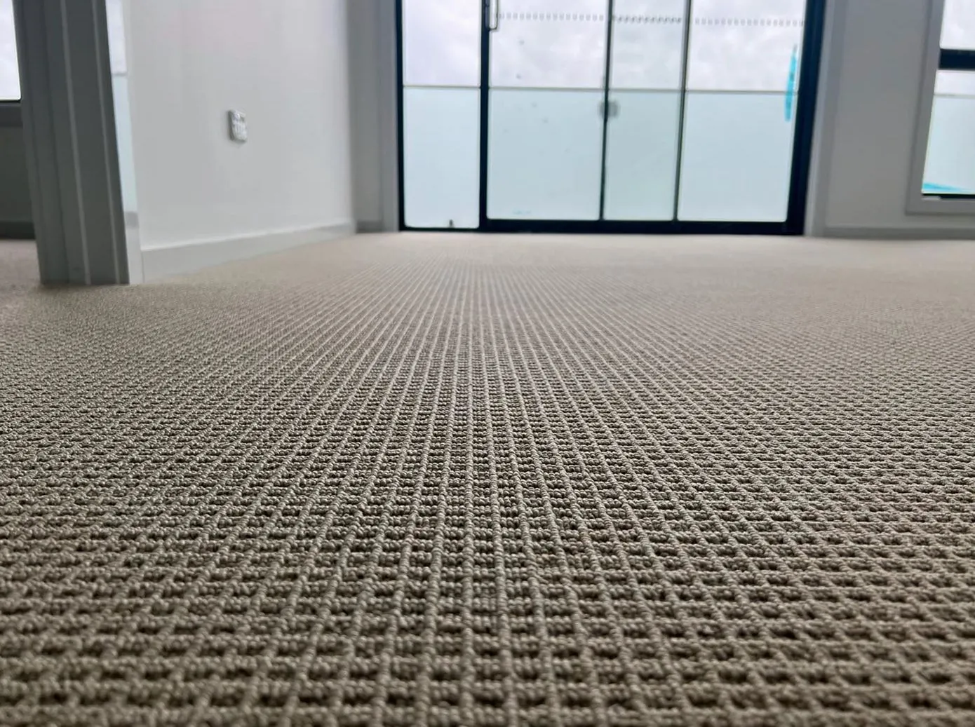 New loop pile carpet replacement in a New York apartment room